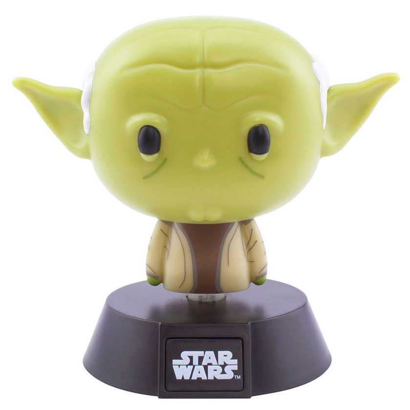 Lampe LED Yoda Star Wars de 10cm allumée sur un bureau moderne