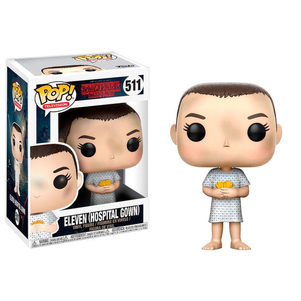 Détail de la figurine Eleven en vinyle avec sa robe d'hôpital et expression caractéristique du personnage