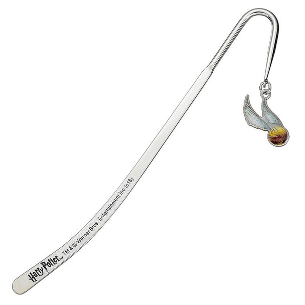 Marque-page doré représentant la Golden Snitch de Harry Potter sur fond blanc, produit par THE CARAT SHOP.