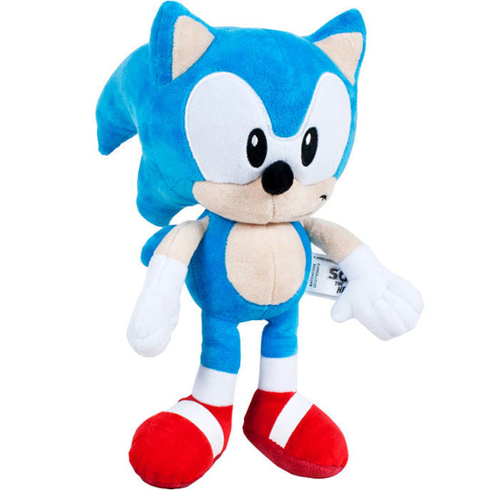 Peluche Sonic SEGA bleue de 30cm, détail du visage et texture douce visible sur fond blanc