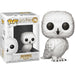 Figurine Funko POP Hedwig de Harry Potter en vinyle blanc, vue de face dans sa boîte cadeau avec fenêtre transparente