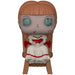Figurine Funko POP Annabelle assise dans une chaise, vue de face avec détails précis du visage et vêtements