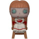 Figurine Funko POP Annabelle assise dans une chaise, vue de face avec détails précis du visage et vêtements