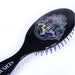 Vue latérale de la brosse à cheveux Harry Potter avec design inspiré de Poudlard