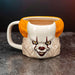 Ensemble des quatre images du mug IT Pennywise présentant différents angles et détails du produit