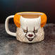 Ensemble des quatre images du mug IT Pennywise présentant différents angles et détails du produit