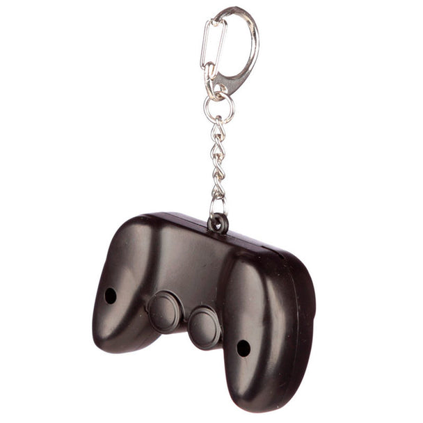 Porte-clés Game Over PUCKATOR avec éclairage LED activé sur fond blanc