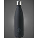 Gourde Water Revolution Black 500ml posée sur une table, sans condensation extérieure