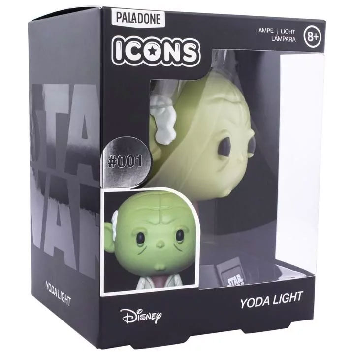 Lampe Yoda Icon Light éteinte posée sur une étagère avec décor geek