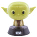Lampe LED Yoda Star Wars de 10cm allumée sur un bureau moderne