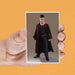 Set de quatre magnets Harry Potter avec effet lenticulaire visible sur fond noir