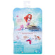 Poupée Ariel posée avec accessoires Royal Shimmer sur un fond clair mettant en valeur ses couleurs vives