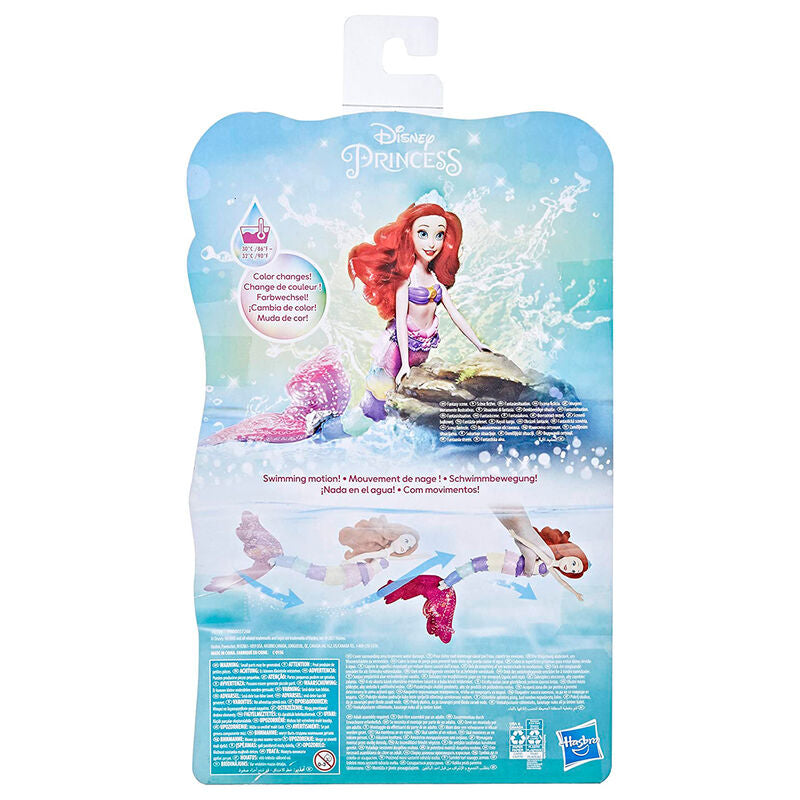 Poupée Ariel posée avec accessoires Royal Shimmer sur un fond clair mettant en valeur ses couleurs vives