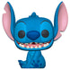 Figurine Funko POP Stitch assis souriant, 9 cm, avec détails colorés et boîte fenêtre transparente