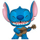 Figurine Funko POP Stitch tenant un ukulélé, issue du film Disney Lilo & Stitch, vue de face en boîte vitrine transparente
