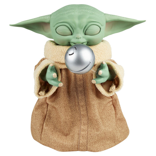 Figurine Baby Yoda animée en position assise avec yeux lumineux