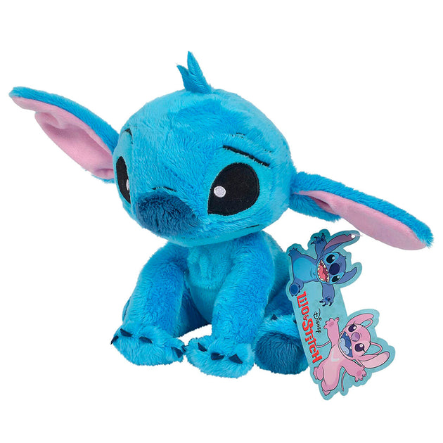 Peluche Stitch Disney 25 cm en position assise montrant sa texture moelleuse et ses couleurs vives