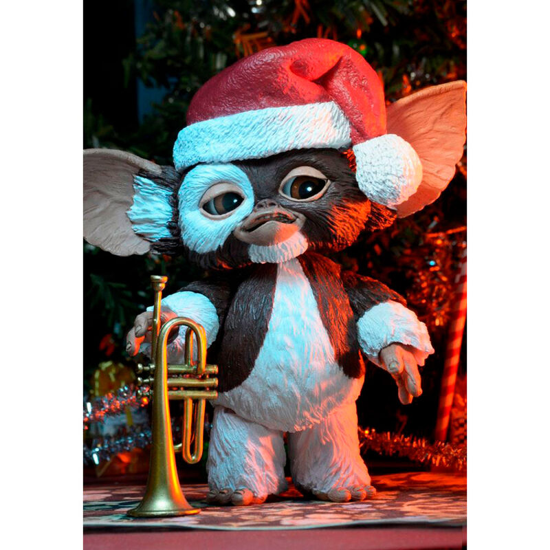 Accessoires fournis avec la figurine Gizmo Ultimate Gremlins exposés à côté du personnage