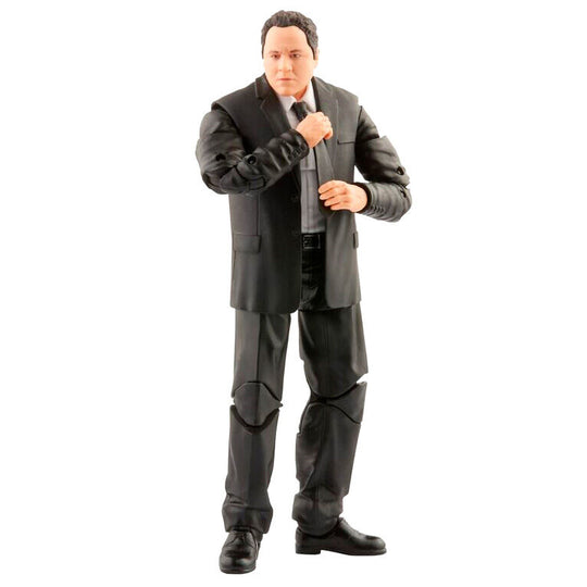 Vue rapprochée de la figurine Happy Hogan montrant les détails du visage et costume