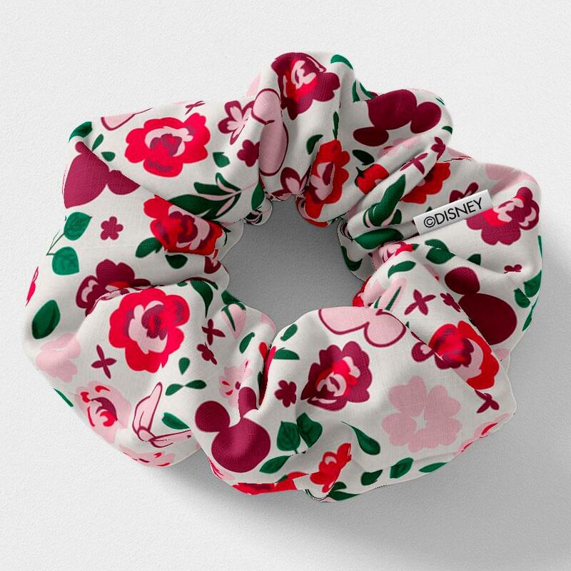 Élastique à cheveux rose avec imprimé Minnie et petits pois blancs visibles