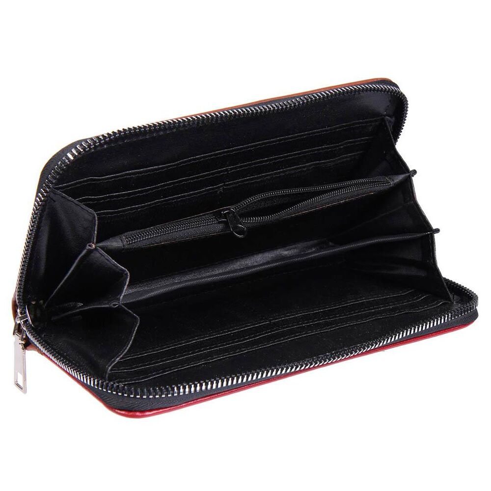 Portefeuille Harry Potter Gryffindor CERDÁ posé sur une surface neutre, mettant en valeur son design compact et élégant