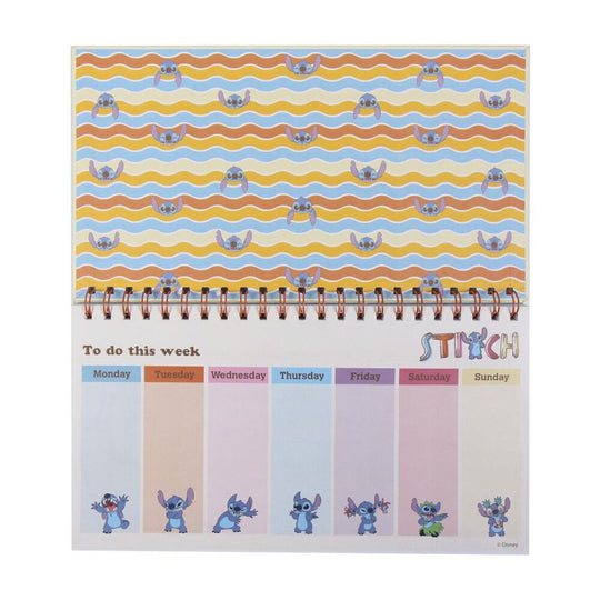 Vue détaillée du planificateur hebdomadaire Disney Stitch montrant les cases journalières pour organiser la semaine