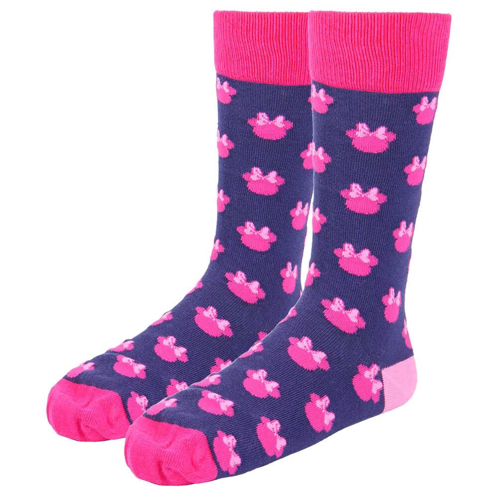 Lot de trois chaussettes Disney Minnie avec différents motifs et couleurs, présentées sur fond neutre