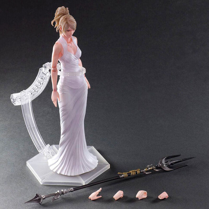 Présentation de la figurine debout avec ses accessoires inclus posés à côté