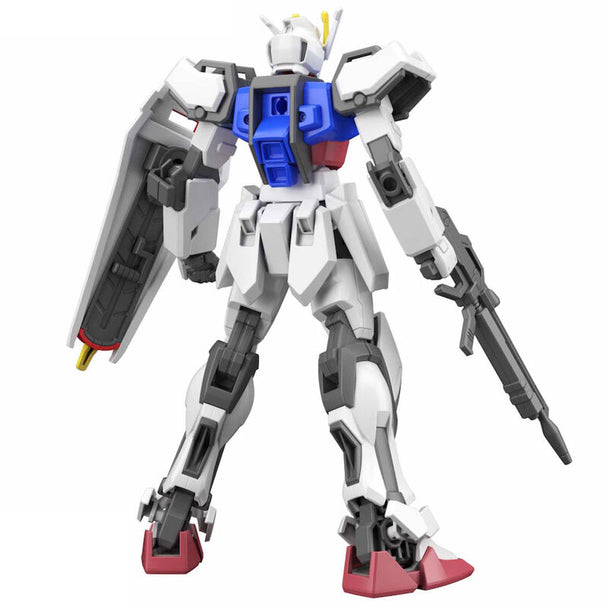 Photo de la figurine Strike Gundam en position dynamique sur base d'action.