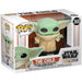 Détail de la figurine Funko POP Baby Yoda The Child avec sa tête verte et ses grands yeux expressifs