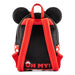 Sac à dos Loungefly Minnie Mouse Cupcake posé sur une surface blanche
