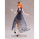 Profil latéral de la figurine Yotsuba Nakano signée BANPRESTO, mettant en valeur la posture dynamique