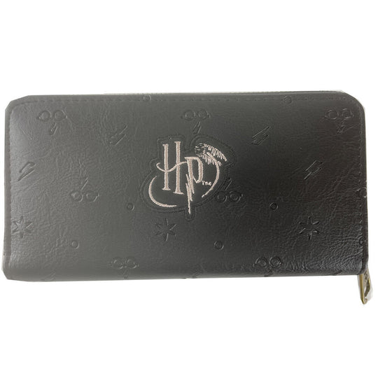 Portefeuille Harry Potter Wings ouvert montrant la poche centrale zippée et les compartiments pour billets