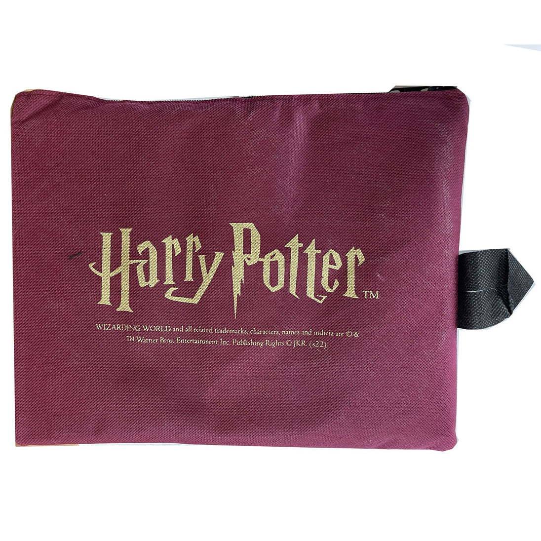 Accessoires du set papeterie Harry Potter incluant règle, surligneur et stylo sur une table