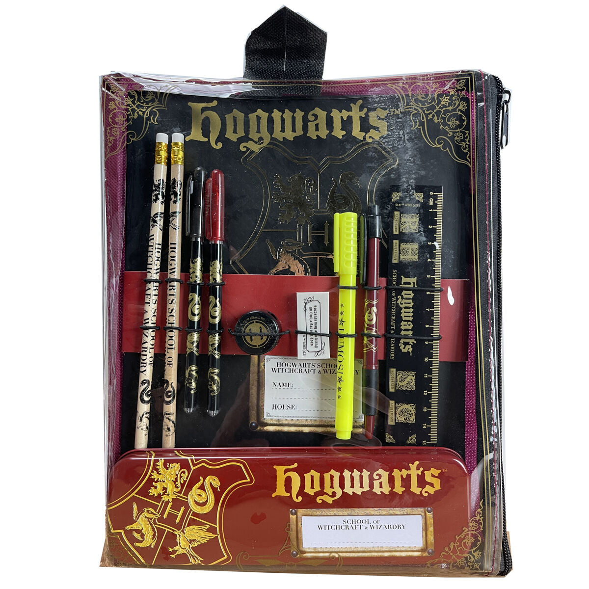 Trousse métallique Harry Potter ouverte montrant crayons, gomme et taille-crayon assortis