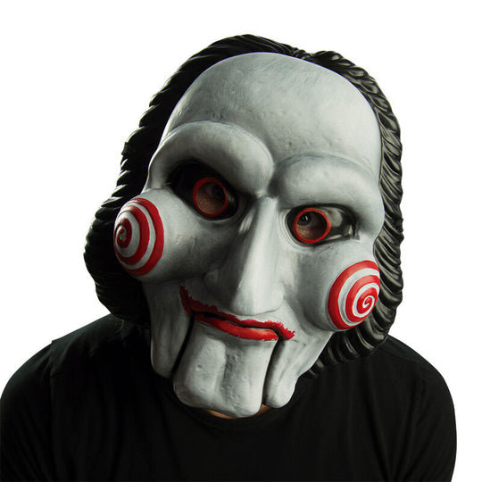 Masque adulte Saw effrayant de la marque RUBIES, idéal pour Halloween et soirées déguisées, avec un design réaliste et détaillé.