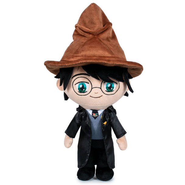 Peluche Harry Potter première année de 29 cm, représentant le jeune sorcier avec ses lunettes rondes et sa tenue emblématique.