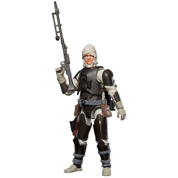Vue latérale de la figurine Dengar articulée de 15cm par HASBRO dans sa tenue emblématique