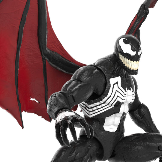 Photo rapprochée des mains articulées de la figurine Venom Marvel Legends