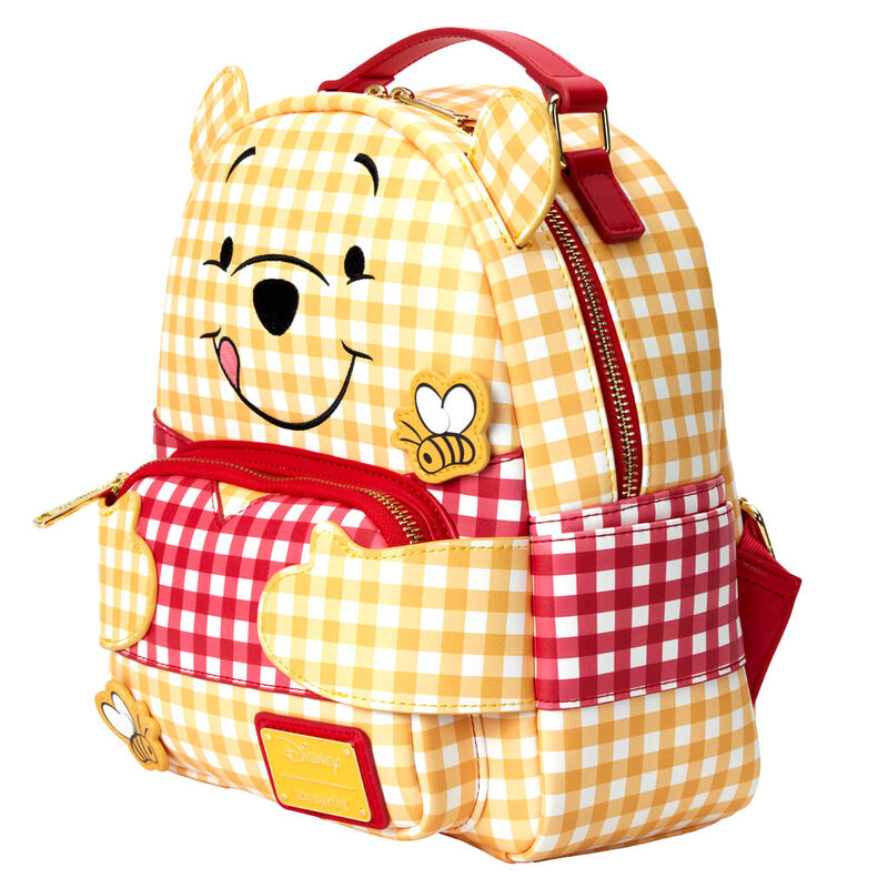 Détail des broderies et appliqués sur le sac à dos Winnie l'Ourson Loungefly