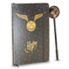 Ensemble complet du coffret Harry Potter Wings incluant carnet fermé et stylo posé à côté