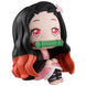 Figurine Nezuko Kamado Demon Slayer posée sur socle avec accessoires visibles