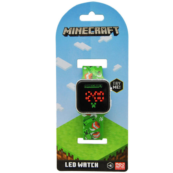 Montre LED Minecraft KIDS LICENSING affichant l’heure avec un design pixelisé coloré.