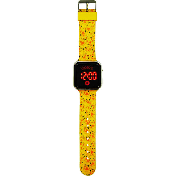Détail du cadran lumineux de la montre Pokémon Pikachu avec le personnage emblématique en arrière-plan
