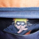Sac à dos Naruto Shippuden posé sur fond blanc mettant en valeur son design et ses dimensions