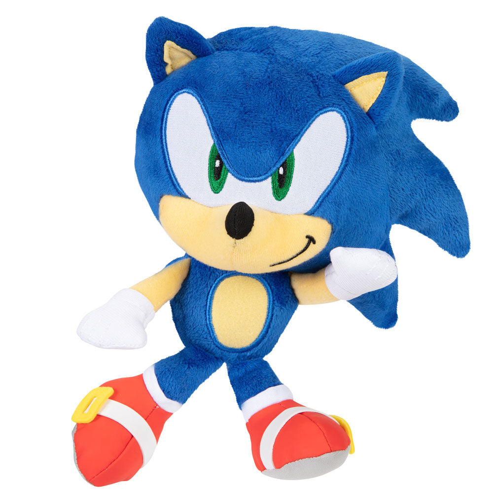 Vue latérale de la peluche Sonic montrant ses gants blancs et chaussures rouges
