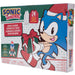 Vue rapprochée d'une fenêtre ouverte du calendrier Sonic dévoilant une figurine miniature colorée