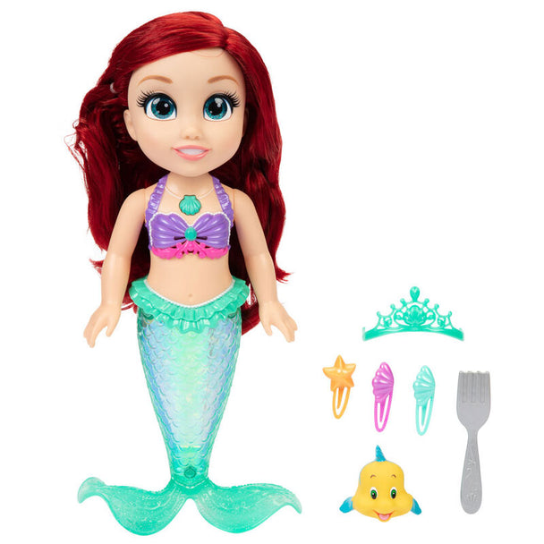 Détail de la poupée musicale Ariel JAKKS PACIFIC avec bouton pour activer les chansons multilingues