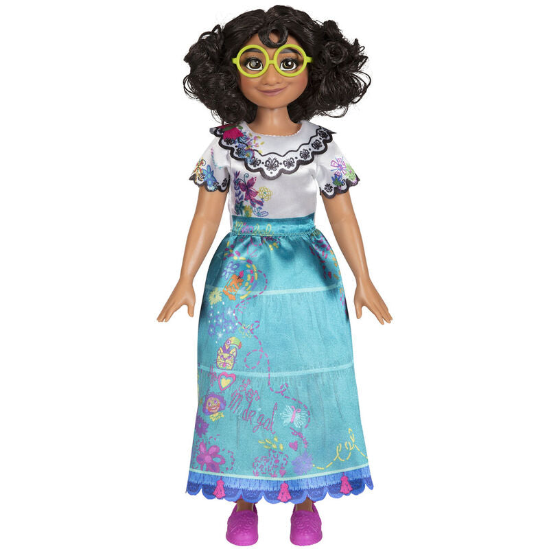 Poupée Disney Mirabel Encanto posée sur un fond neutre, mettant en valeur ses vêtements et accessoires