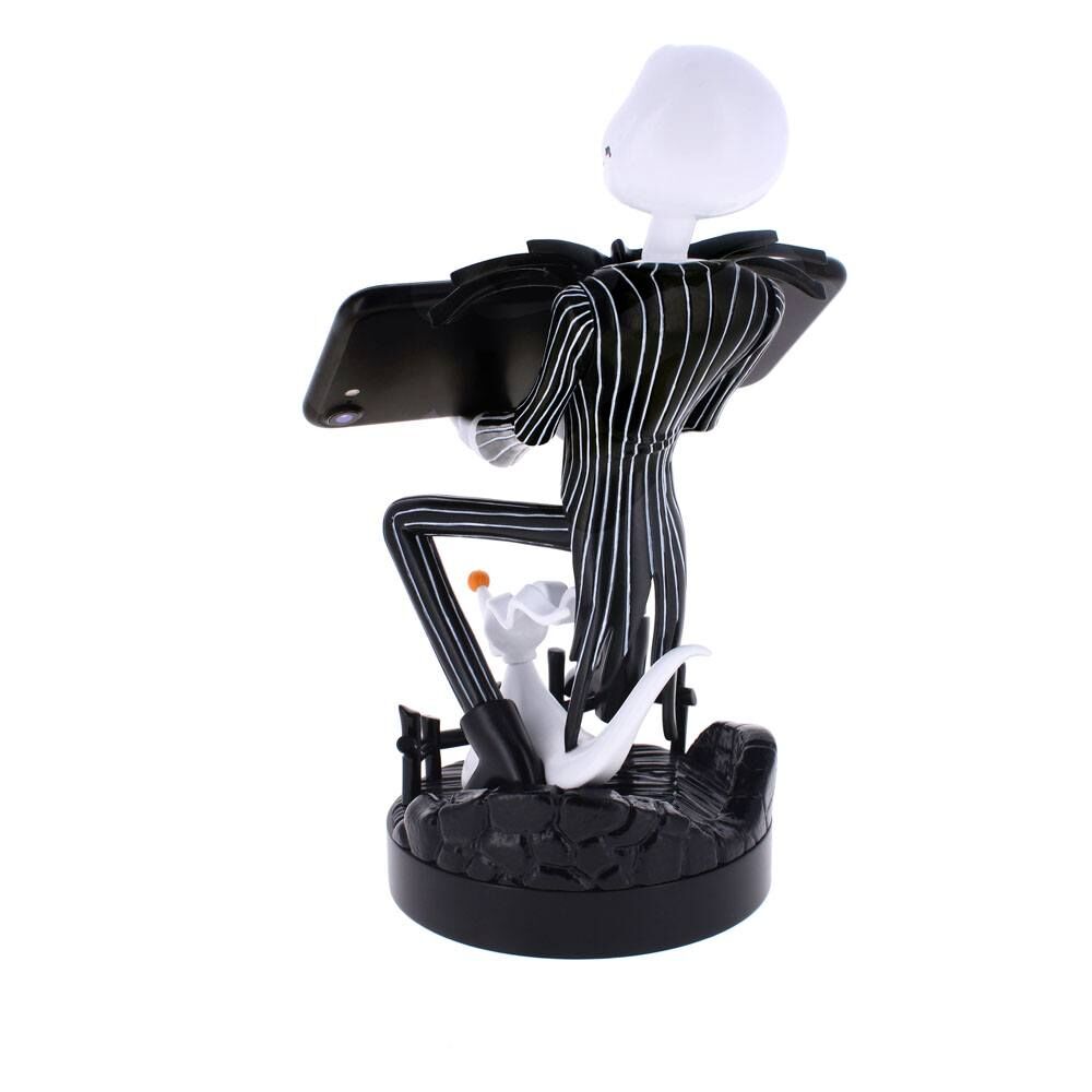 Support manette Jack Skellington tenant une manette Xbox Series X sur bureau